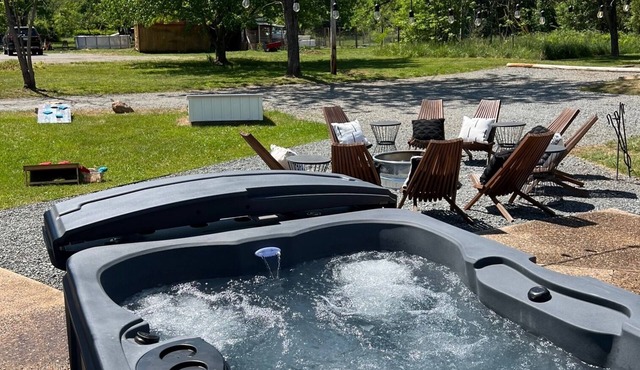 Cozy 3BR cottage near Nelson 151 with a private hot tub, fire pit, yard games, and inviting gathering spaces. Perfect for relaxed wine weekends, family trips, and Blue Ridge getaways.