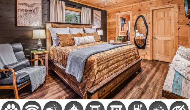 Creekside 2BR cabin near Pigeon Forge with firepit, WiFi, EV charger, and pet-friendly charm.