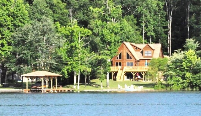 Enchanting 5-Bed/5-Bath Lakefront Log Cabin with Private Cove, Beach & Hot Tub. in Bumpass