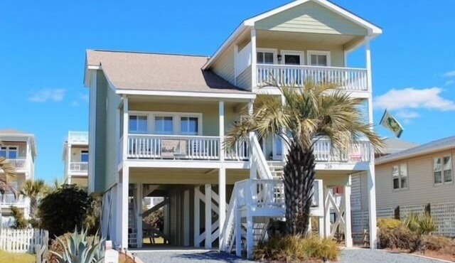 Experience coastal bliss at Reel Blessed, a spacious 4-bedroom haven in Holden Beach.