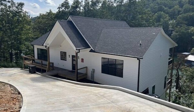 Lakefront | 2 slip covered dock | Hot tub | Chef's kitchen