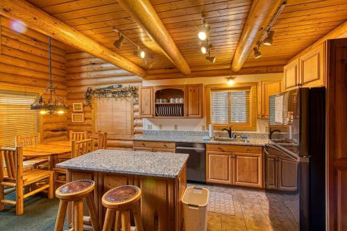 Luxurious Forest Cabin with Hot Tub and Game Room Near Outdoor Adventures in Island Park, Idaho in Trude