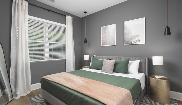 Modern Spacious Condo with Parking by Downtown Broadway