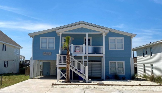Oceanfront 5BR beach house with pool in Holden Beach, perfect for 12 guests.