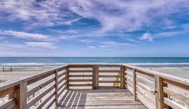 Oceanfront with panoramic views! Direct beach access from covered deck.