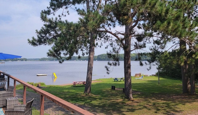 Rustic cabin getaway on the shore of Soo Lake in Phillips, WI in Phillips