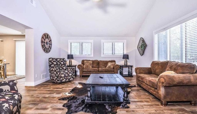 Updated, tree-lined home on the snowmobile trail with gas fireplace & firepit in Manitowish Waters