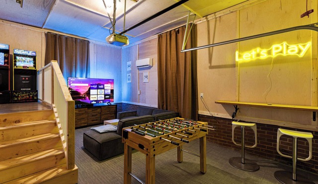 Walk to town center, game room, hot tub, large backyard
