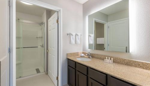 One-Bedroom Queen Suite with Sofa Bed - Mobility and Hearing Accessible with Roll-in Shower
